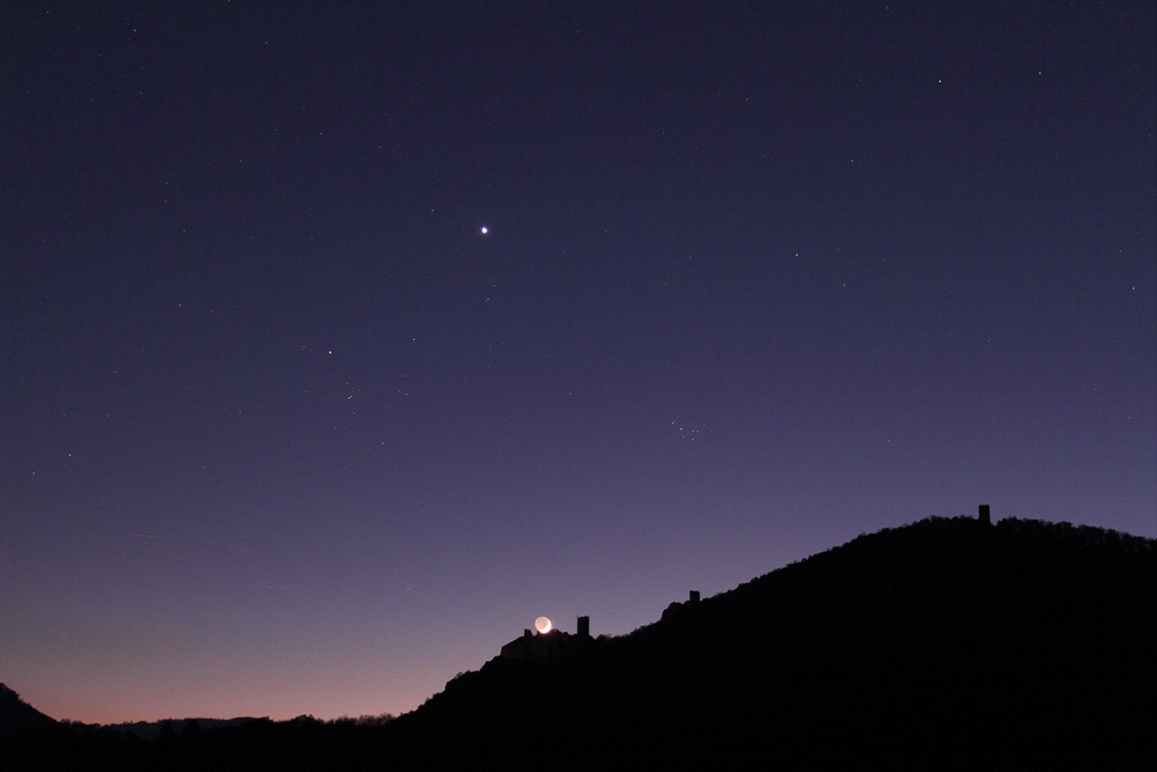 Photo of Venus at night as the sun sets.