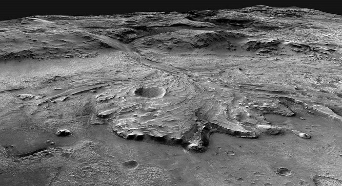 Image en noir et blanc du cratère Jezero. On y voit comme les traces du lit d'une rivière, qui forment un delta. La rivière se déversait autrefois dans le cratère. 