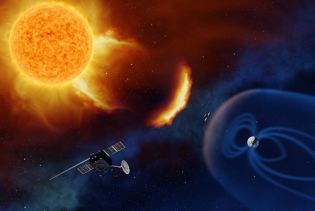 Le Soleil en haut à gauche de l'image, envoie particules et rayonnement en direction de la Terre (en bas à droite) sous la forme d'un arc de cercle brillant. La Terre est représentée avec sa magnétosphère bleutée, et l'on voit deux satellites clairement exposés à la tempête solaire car en dehors de cette bulle. 