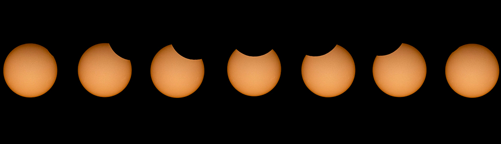 Photomontage montrant une succession de photos prises pendant l'éclipse du 10 juin 2021. On voit des croissants de Soleil de différents aspects, dans l'ordre chronologique du déroulement de l'éclipse.